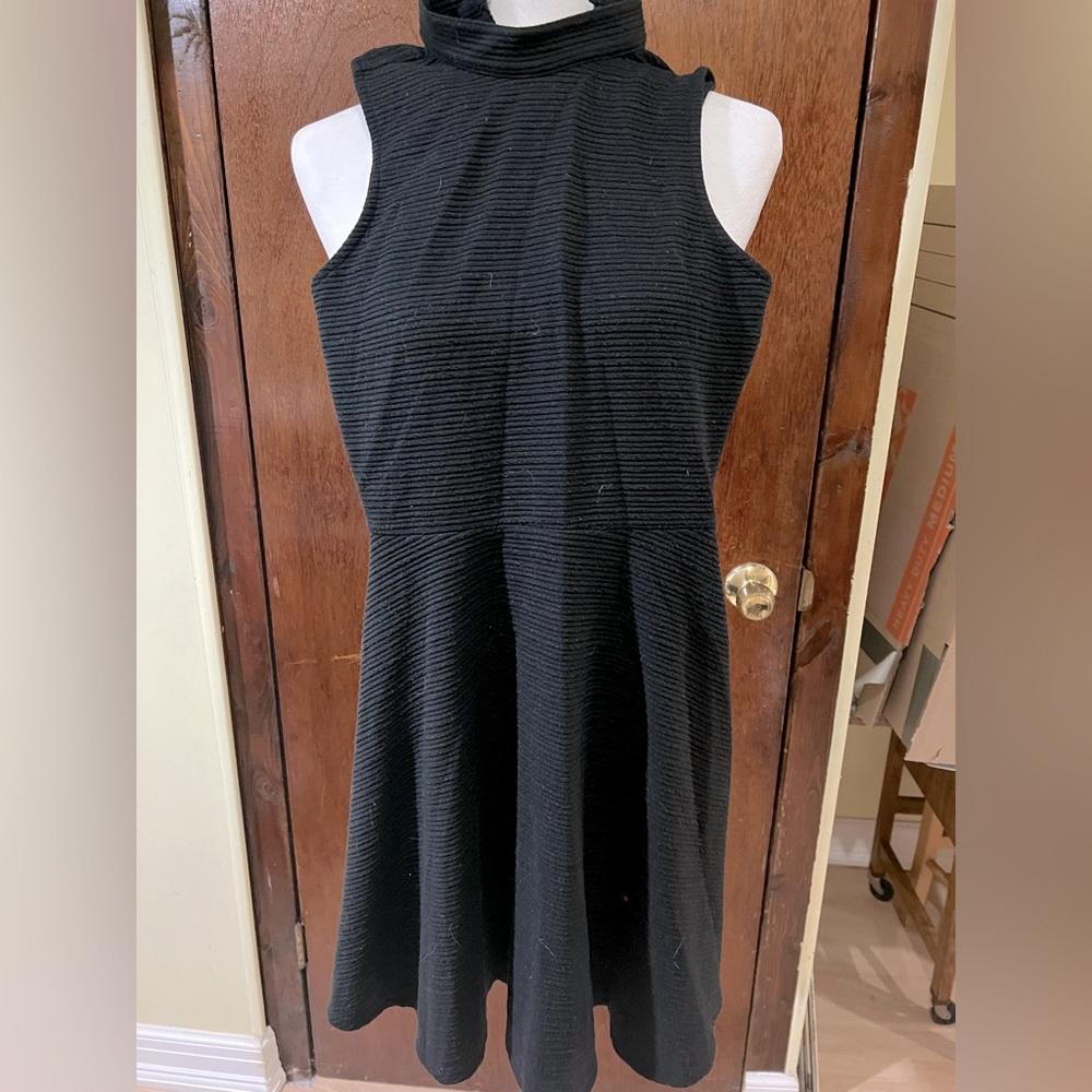 Black spandex sleeveless dress in excellent condition.